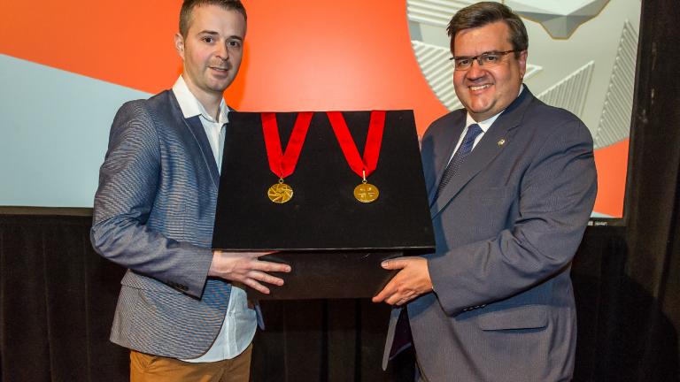 Mayor of Montreal Denis Coderre and Industrial designer Jacques Desbiens unveiling the Ordre de Montréal medal at City Hall on May 27, 2016